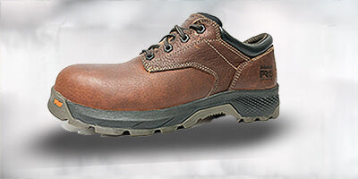 Brown steel toe oxford shoe with a rugged sole, perfect for casual wear in industrial environments