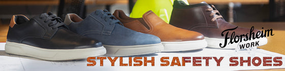 Florsheim Work stylish safety shoes in black, blue, tan, and brown displayed on a workbench