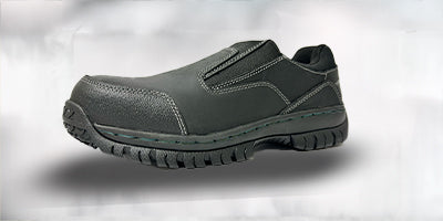 Black slip-on safety toe shoes with a sturdy sole, providing easy wear and robust safety features.